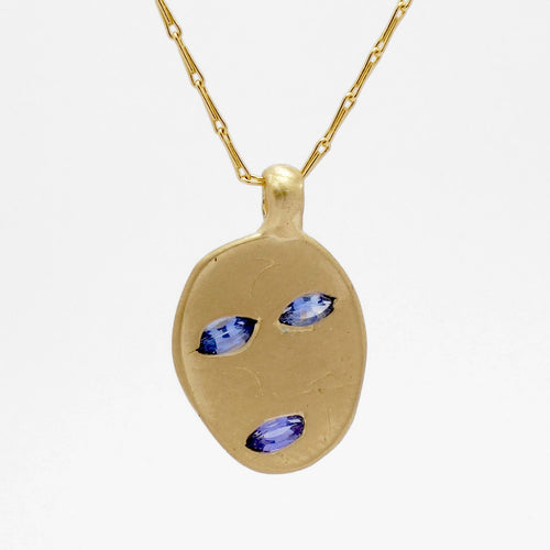 Fraser Hamilton Jewellery | 'Ebb' Blue Sapphire & Gold Mask Pendant on a Gold Chain